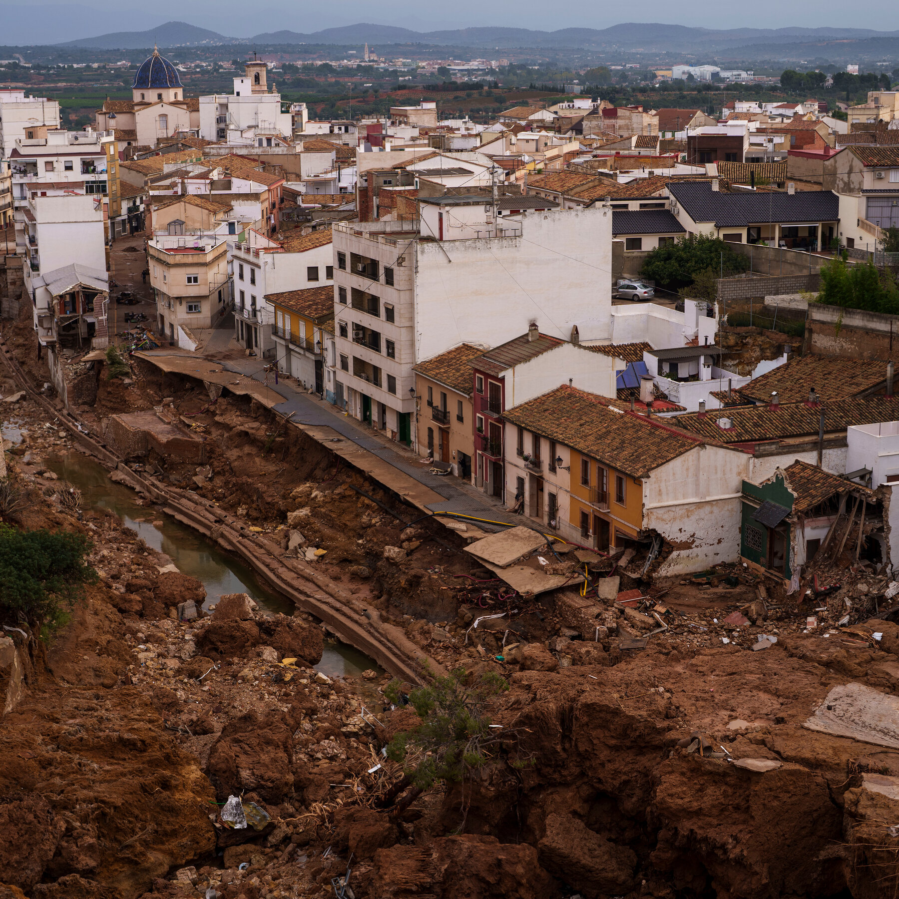 Did Climate Change and Late Warnings Add to Spain’s Flooding Disaster? Locals Say Yes.